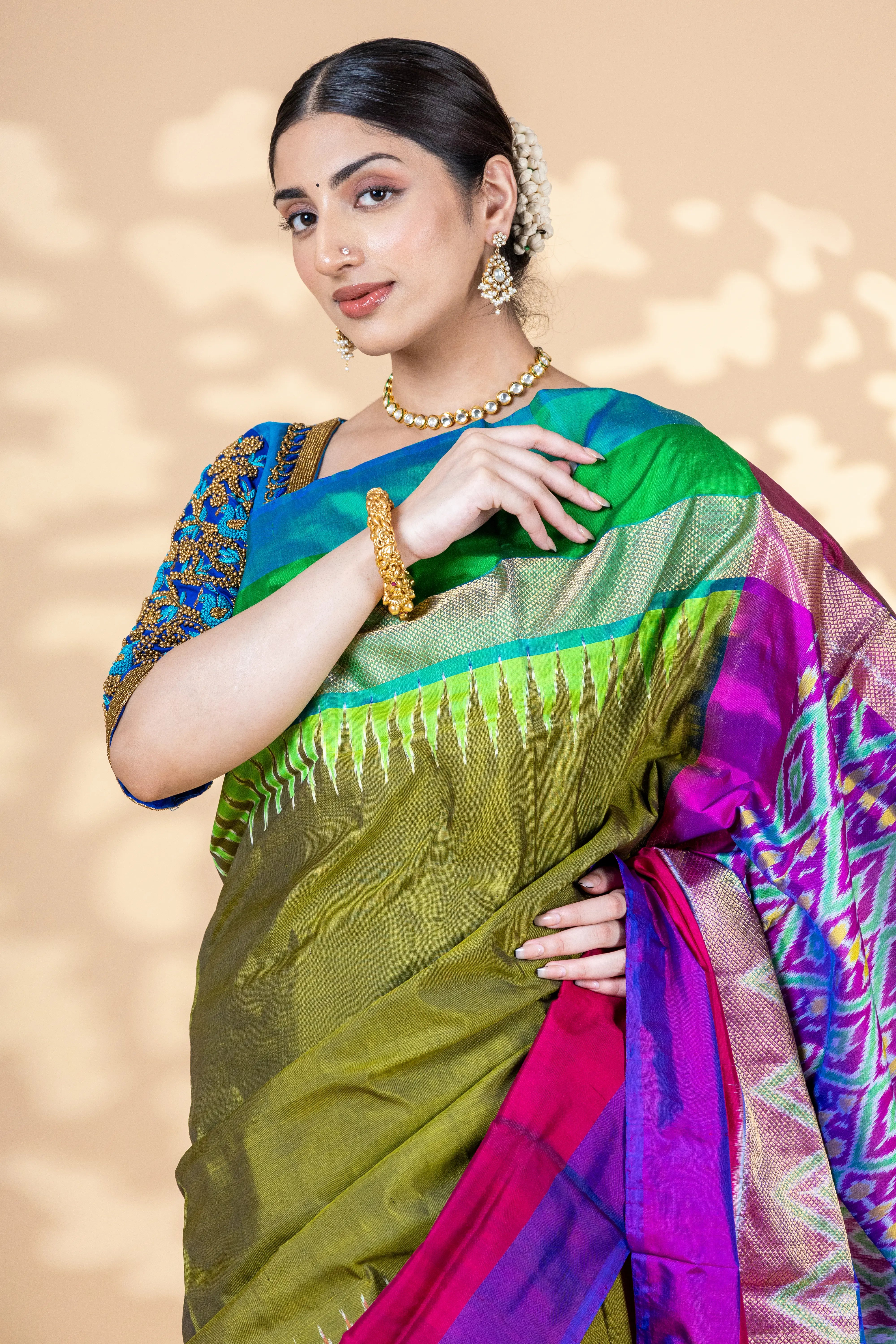 Mehendi green pochampally silk saree with purple pallu and blue, green and zari border